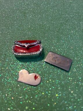 Rare, Laura Adam’s red enamel purse pendant $10